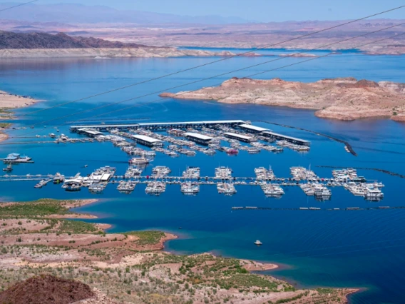 Boats docked along the shores of the Colorado River forming Lake Mead in Boulder City