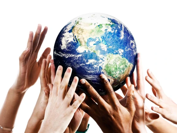 Hands holding up a globe