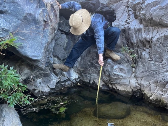 Oskar Anderson samples pond