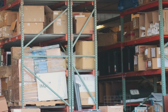 Warehouse shelves stocked with previously used items for sale