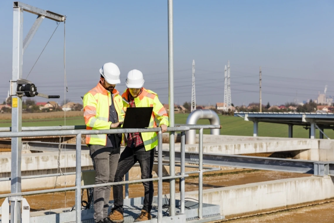 environmental engineers working outside