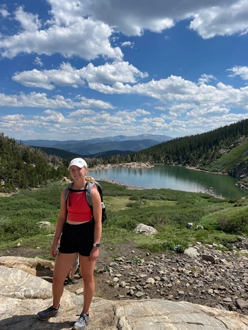 Grace Toftner hiking outside