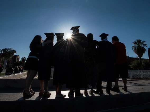 UA graduates at old main