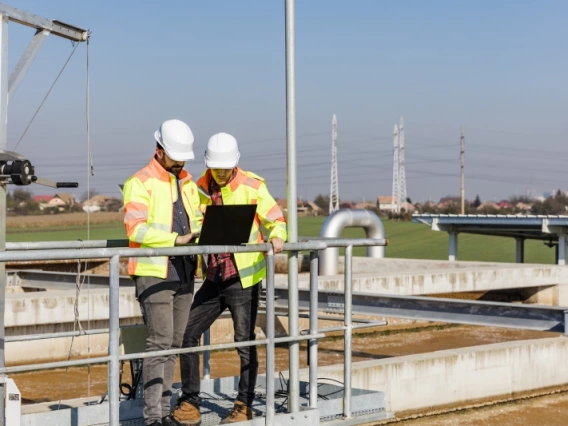 environmental engineers working outside