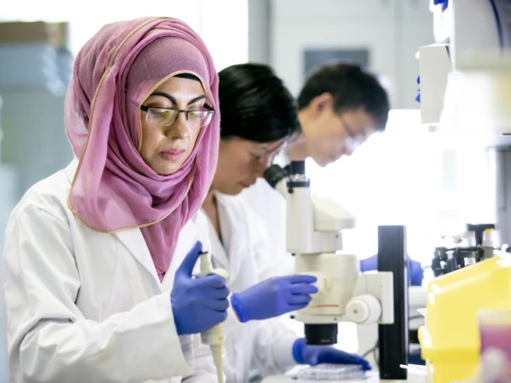 Scientist measuring out chemicals in a laboratory