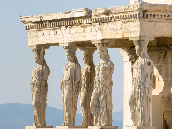 Ancient Greek statues in an Athens building