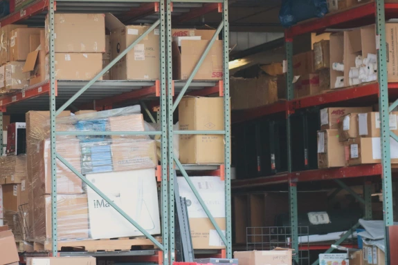 Warehouse shelves stocked with previously used items for sale