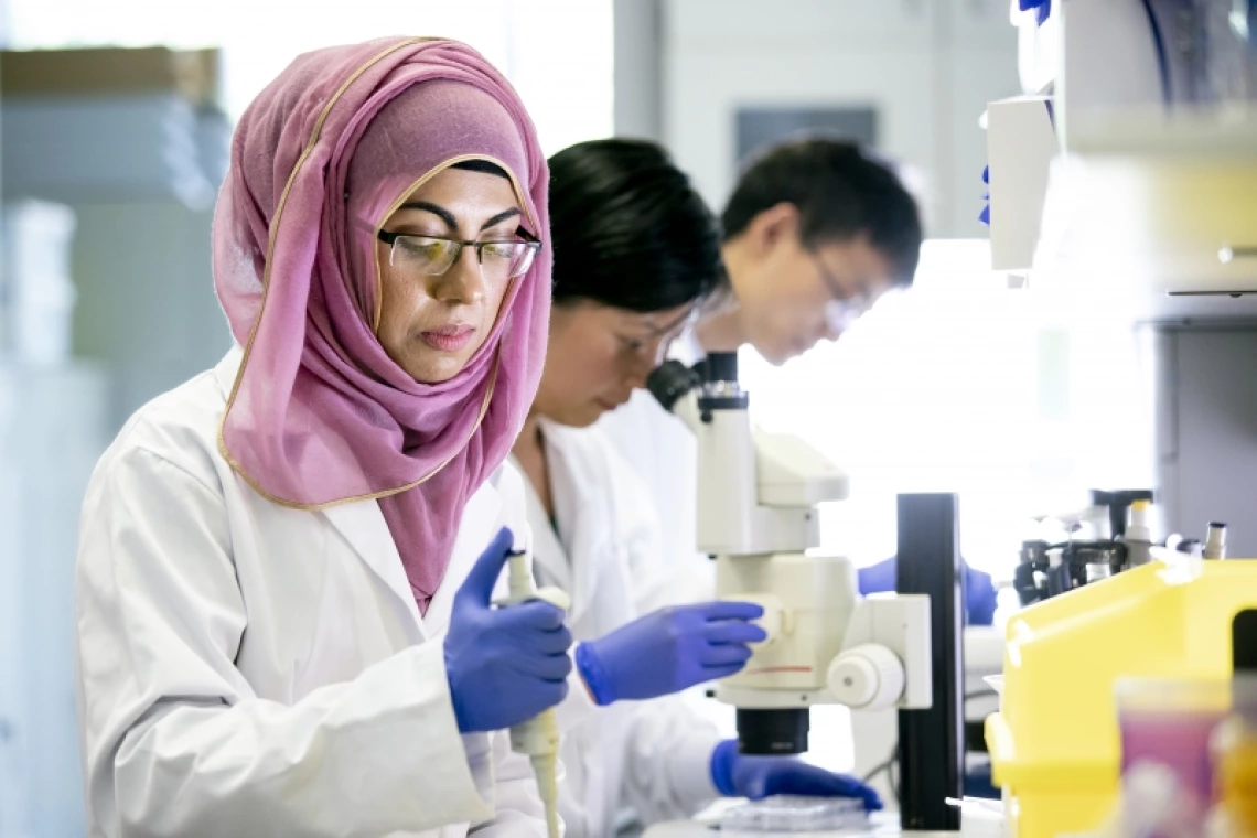 Scientist measuring out chemicals in a laboratory