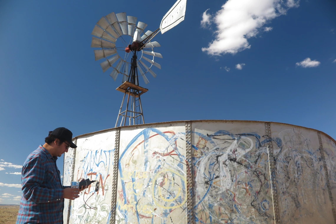 Chris Yazzie at windmill site