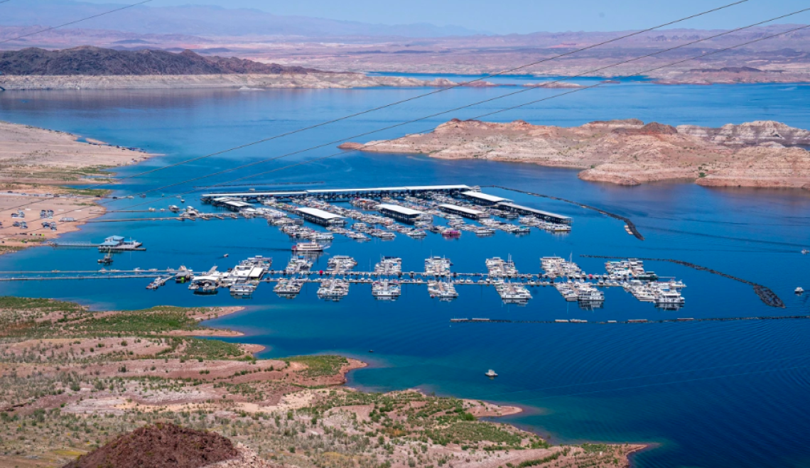 Boats docked along the shores of the Colorado River forming Lake Mead in Boulder City