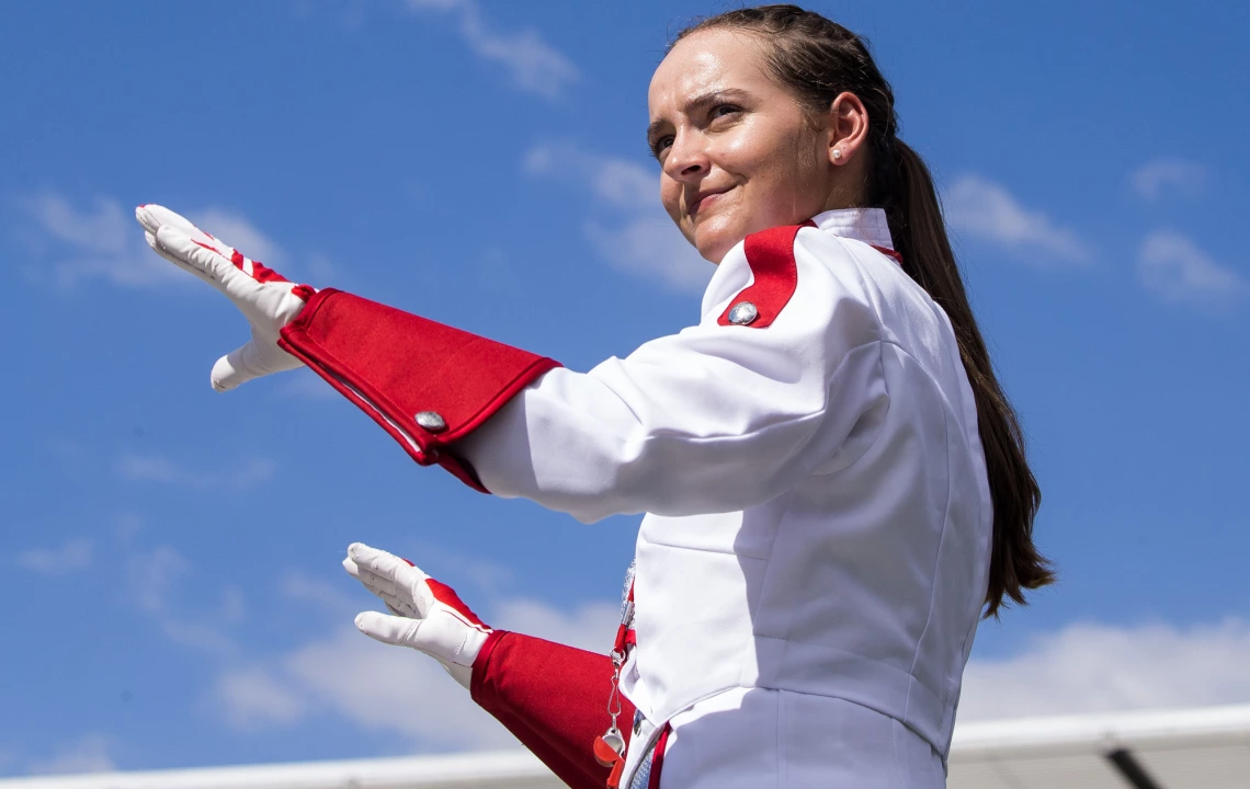 Grace Adams as one of the drum majors of the University’s premier marching band, the Pride of Arizona.