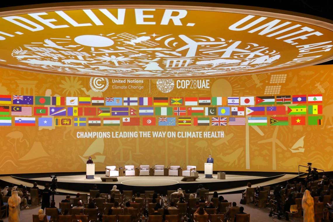 COP28 Conference Room with participating flags