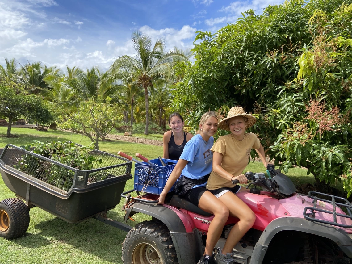 Greta Cotraccia outside on a tractor.