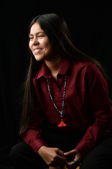 Bianca Rodriguez in a red shirt