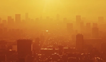 Hazy cityscape at sunset